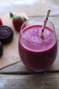 Smoothie with beets, carrots, and strawberries