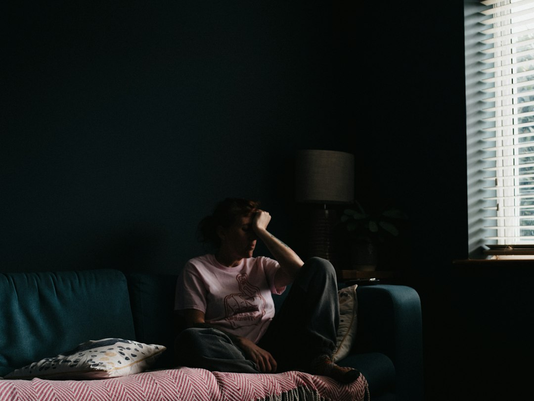 Person feeling unwell at home with respiratory symptoms